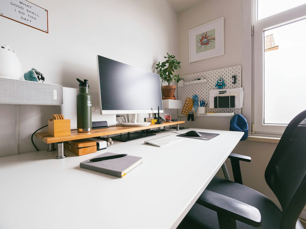 Creative workspace with standing desk and dynamic furniture arrangement