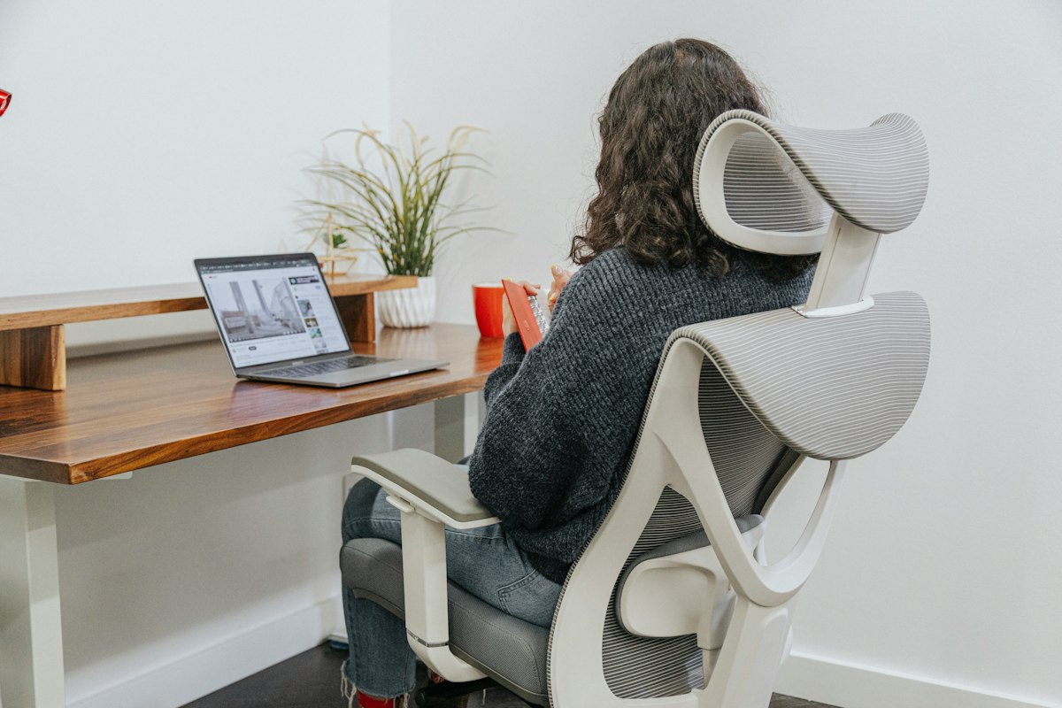 Compact home office maximizing vertical storage and ergonomic efficiency